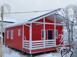 Скандинавский каркасный дом 7 на 11 с террасой, две спальни, кухня-гостиная. Цвет стен фасада RAL3020